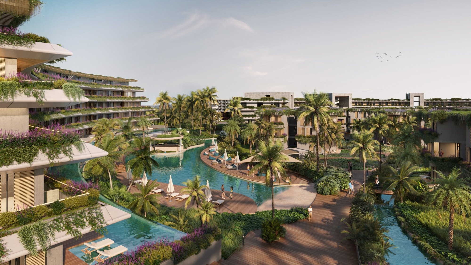 Rendering of River Island from above, its turquoise pool network winding between green-roofed blocks: 16 pools, roughly 1 mile inland from El Cortecito.