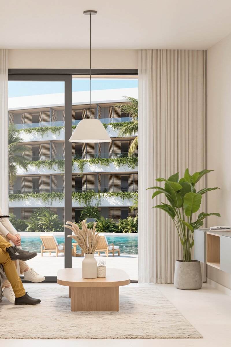Recreación de una sala terminada en River Island, Punta Cana, donde los condos de la comunidad de Atlántida llegan hasta los $369,000.