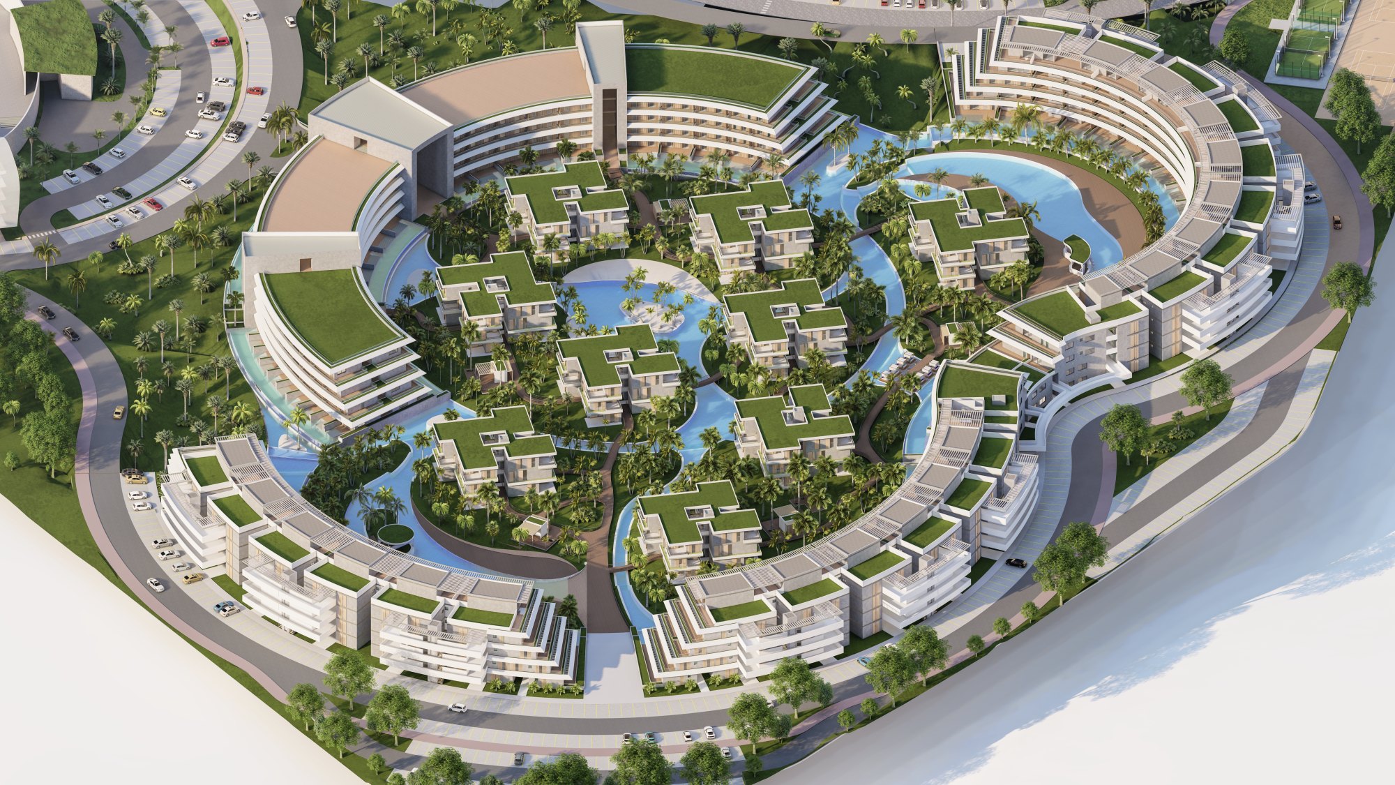 Recreación aérea cenital de River Island, en Punta Cana: el anillo de edificios y la piscina-río ramificada que albergarán 692 residencias.